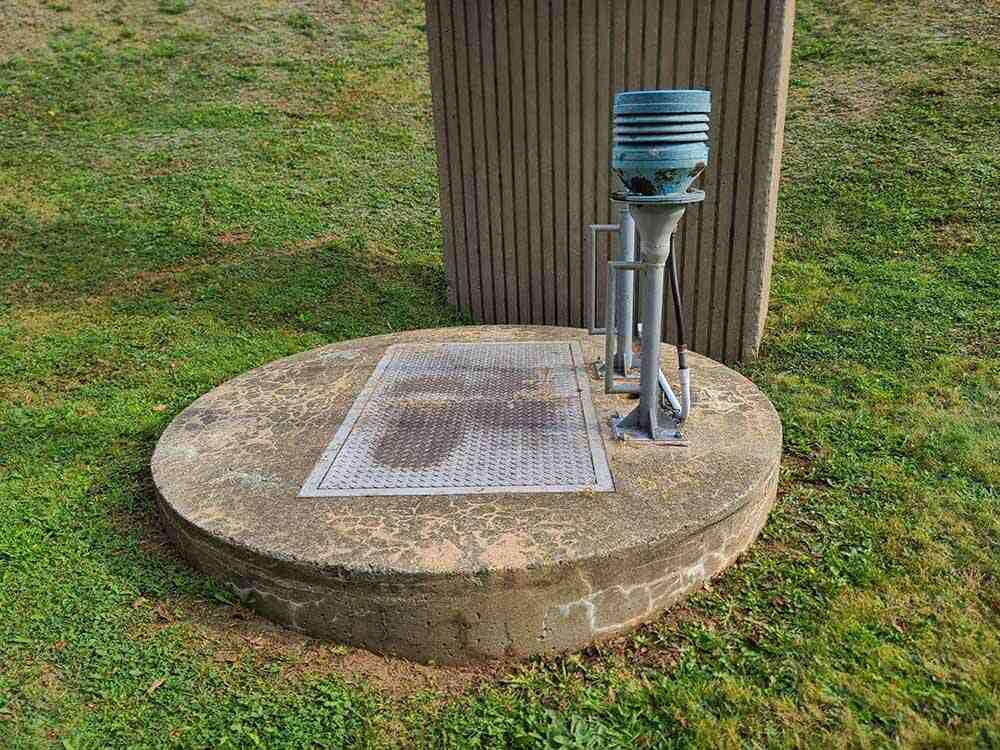 Las Vegas Septic Service technician inspecting a lift station