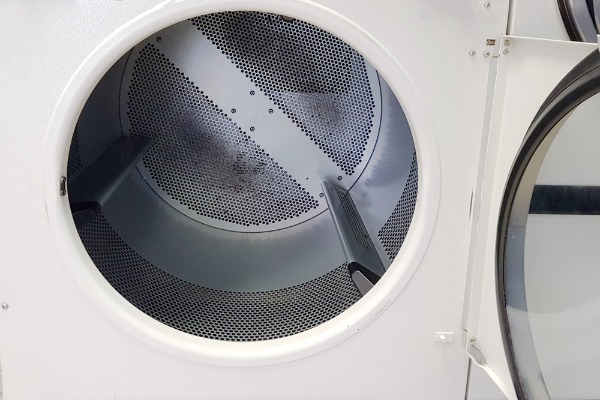 empty open clothes dryer drum