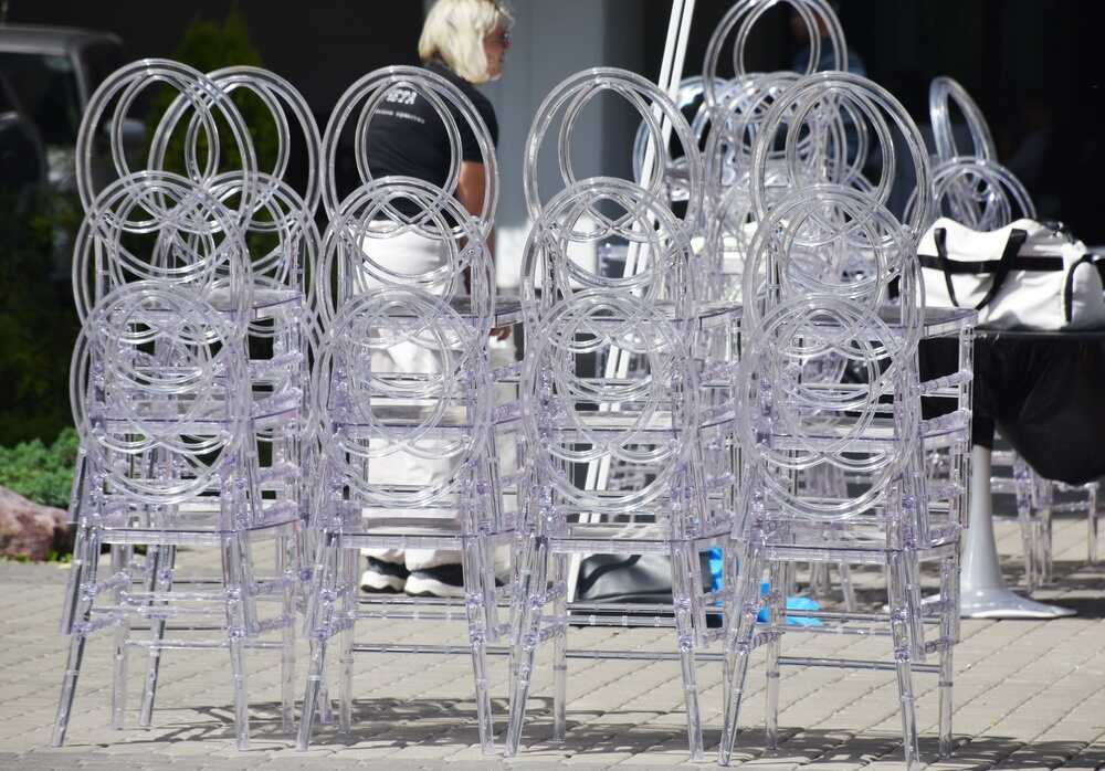 stacked transparent event chairs